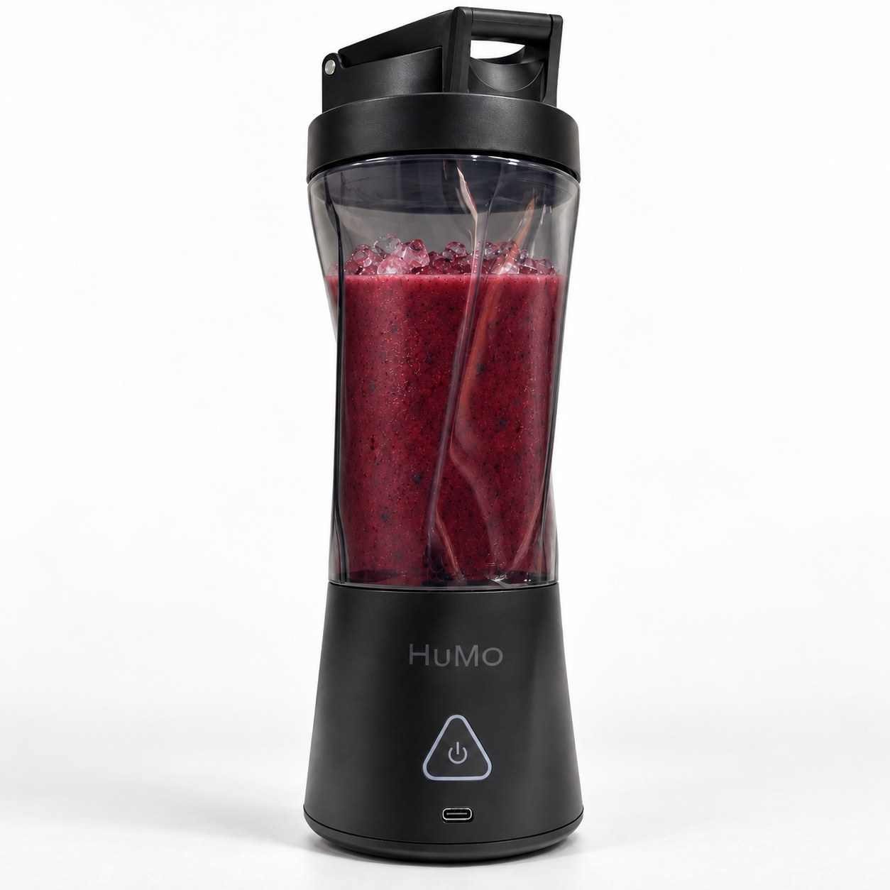 HuMo portable blender with a dark tinted cup, carry handle and berry smoothie